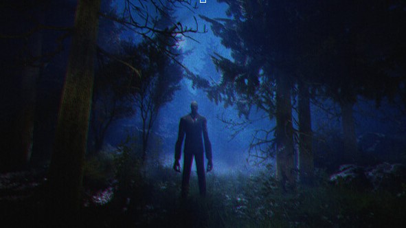 An image of Slenderman standing in a dark clearing in the woods, facing the camera,