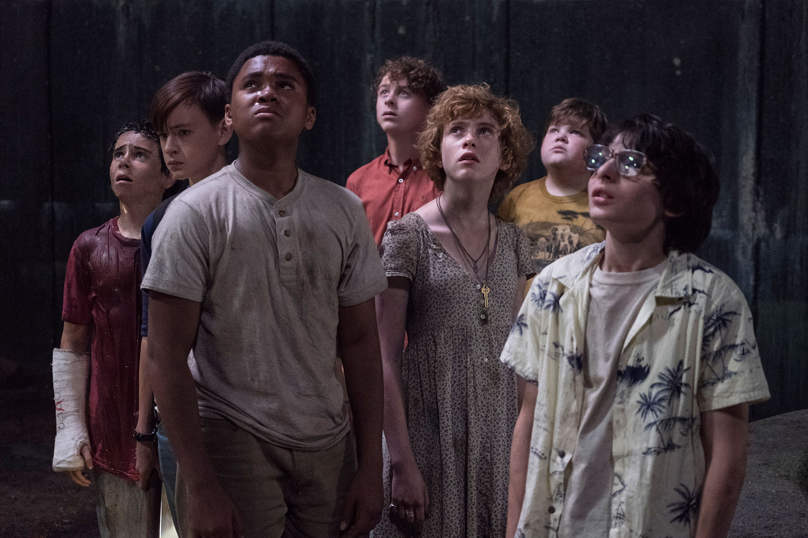 The Losers Club from 2017’s It look on as It’s victims float above them.(It, 2017)