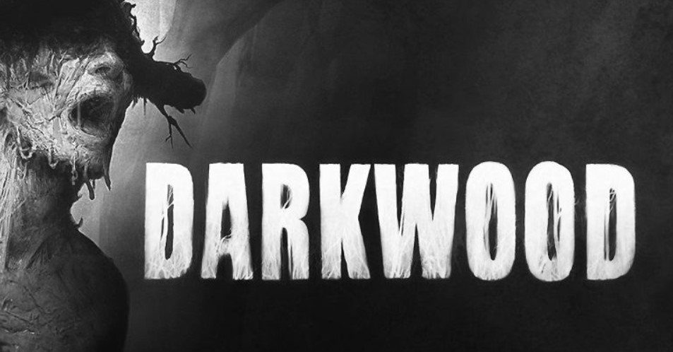 Monstrous figure in pain in the left of the screen leading to a dark background with the text that reads, "Darkwood"
