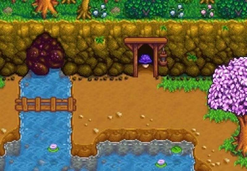 Purple mushroom in front of the entrance to the mines.