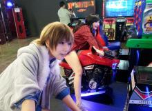 Tasha and Doremi enjoying the arcade. (from https://www.facebook.com/photo.php?fbid=704975459635947&set=a.133005816832917.26566.100003704979501&type=3&theater)