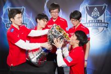 SKTT1 being silly with their new trophy, the Summoner's Cup.