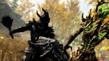 A warrior in daedric armor swings a mace at an angry Spriggan. 