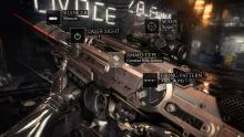 Adam Jensen inspects his gun's loadout in Deus Ex: Mankind Divided