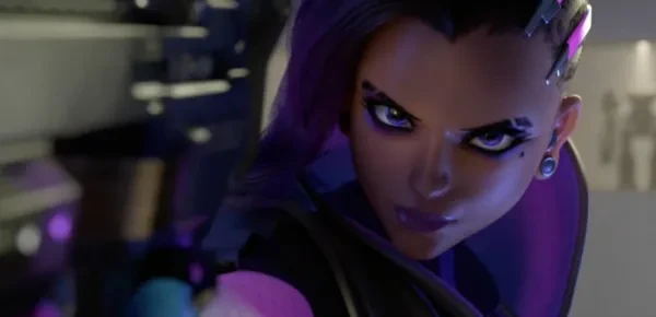 “Everything can be hacked... and everyone.” Sombra pointing her gun at the screen