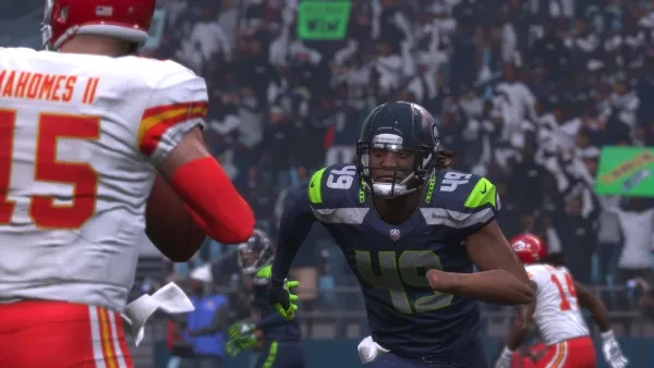 Shaquem Griffin (49) of Seattle going after Patrick Mahomes II of Kansas City. After the tackle, they might make dinner plans for each other. 