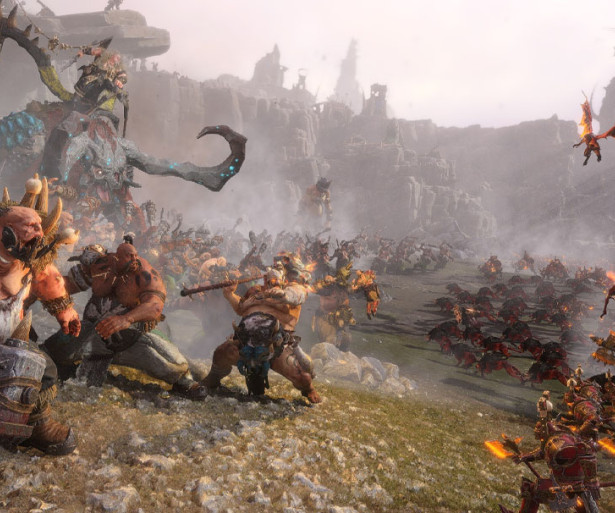 Warhammer 3 capture, a clash between chaos warriors and ogres.